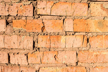 background brick wall in the sunlight