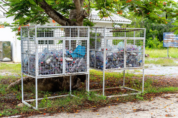 Suphan Buri, Thailand - July 12, 2021: Used water bottles and kept in the trash. Plastic bottles...