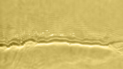 Subtle yellow texture of light-shadow pattern of sunlight reflection from rippled water surface. Beautiful natural pattern with 3D feeling. 