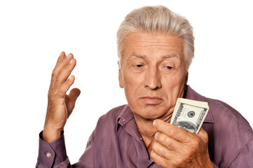 Close up portrait of senior man with dollars