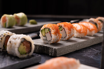 Sushi pieces placed on top of stones