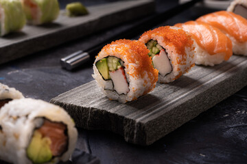 Sushi pieces placed on top of stones