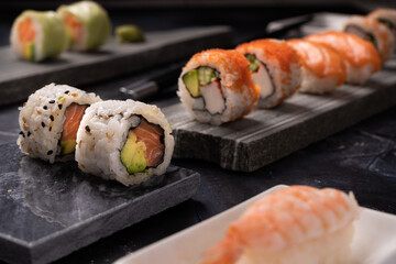 Sushi pieces placed on top of stones