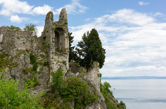 Ruins of the old medieval castle of Duino, on a promontory on the rocky coast of northern Adriatic sea, near Trieste, Italy