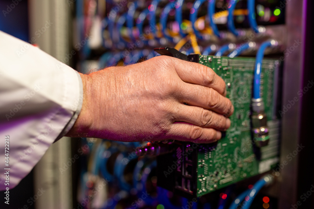 Poster Installing Server Component Into Cabinet
