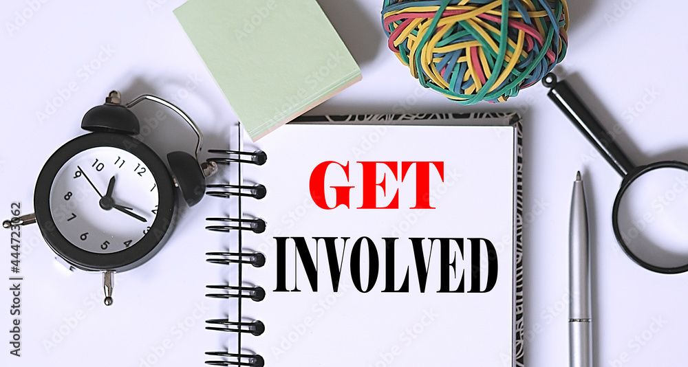 Poster get involved text written on notebook page with office tools