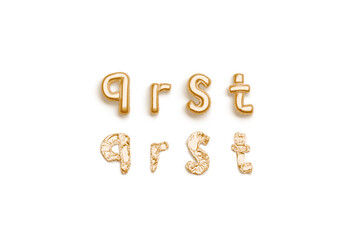 Inflated, deflated gold q r s t letters, balloon font