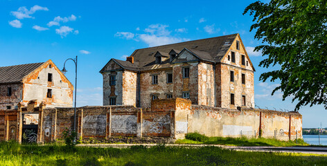 Ruins of historic Elk castle of Teutonic Order - Zamek w Elku - at Zamkowa street on shore of Jezioro Elckie lake in Masuria region of Poland
