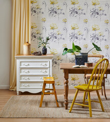 Modern wallpaper background in the room, wooden furniture table chair concept and cabinet, yellow carpet and green vase of plant.