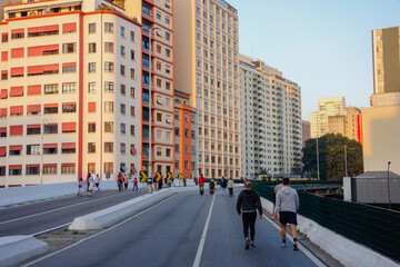 citizens walk the viaduct known as Elevated highway Minhocao, or Elevado Presidente Joao Goulart, in Sao Paulo downtown, Brazil