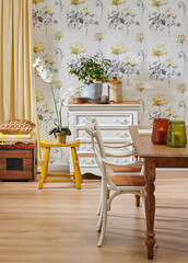 Modern wallpaper background cabinet table and wooden chair style, vase of plant and yellow curtain interior decor.
