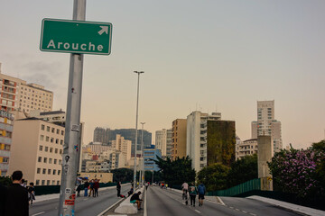 Arouche district plaque and city buildings in Sao Paulo downtown, Brazil, on the Minhocao elevated highway