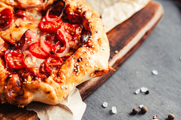 Pizza. Breakfast pizza with ham, cheese and tomato. 