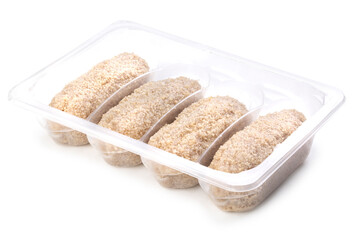 Raw fresh chicken cutlets in plastic transparent container