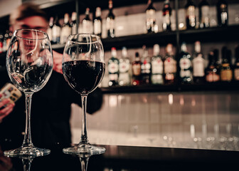 two red wine glass in cafe or bar
