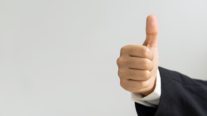 a woman's hand thumbs up bulge on a white background