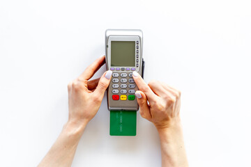 Hand paying by card with pos payment terminal. Payment transactions concept