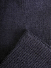 the edge of multi-colored socks, curved sleeves, several layers of fabric