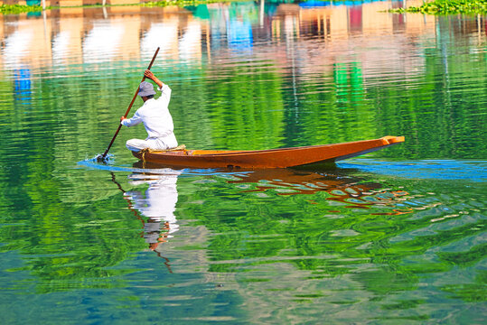 Srinagar, India 07 - July, 2018 : Lifestyle in Dal lake, local man use shikara boat, This is the local transportation in the lake of Srinagar. Jammu and Kashmir state, India