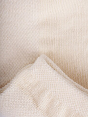 the edge of multi-colored socks, curved sleeves, several layers of fabric