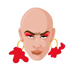 Portrait of a woman with white skin. She is bold and wears large dangly red earrings and reg eyemakeup