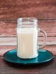 white milk kefir in a glass mug