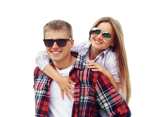 Obraz premium Portrait close up of happy smiling young couple hugging together, man giving piggyback ride to woman wearing a sunglasses isolated on white background