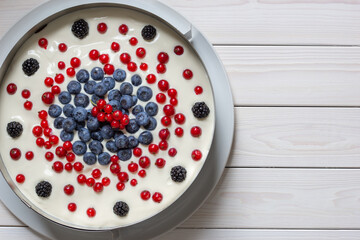 cake ring around a berry layer cake, top view