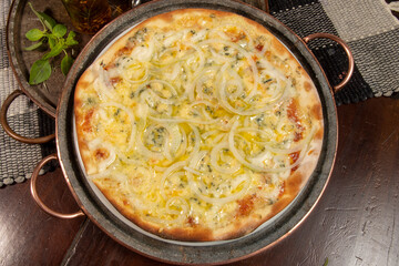 Brazilian style pizza with mozzarella, cheese, onion