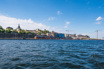 Views of Stockholm from the ferry to Djurgarden Island, popular attraction and tourist destination in Stockholm, Sweden. Beautiful sunny day.