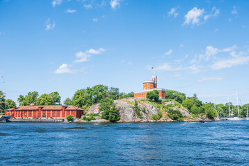 Fototapeta na wymiar Views of Stockholm from the ferry to Djurgarden Island, popular attraction and tourist destination in Stockholm, Sweden. Beautiful sunny day.