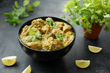 Green chicken Curry , Chicken Hariyali Tikka, Chicken Hara Masala , chicken hariyali Indian style. palak spinach Chicken or Murg Saagwala served in with coriander leaf,.Hyderabad India