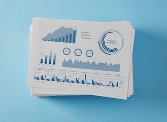 Stack of paper with charts and graphs