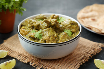 Green chicken Curry , Chicken Hariyali Tikka, Chicken Hara Masala , chicken hariyali Indian style. palak spinach Chicken or Murg Saagwala served in with coriander leaf,.Hyderabad India