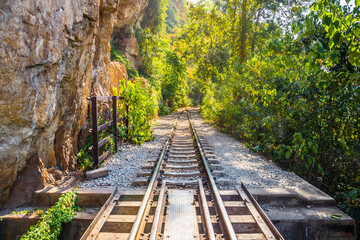Obraz premium The Death Railway crossing kwai river in Kanchanaburi Thailand. Important landmark and destination to visiting and world war II history built