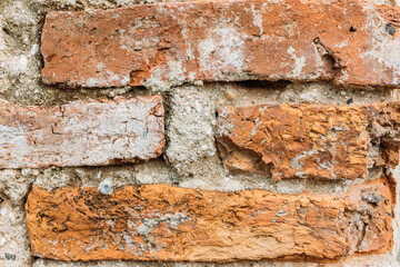 Brick wall with red brick.Texture of a stone wall. Antique brick texture.