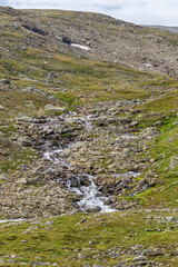 Waterfall in a block field landscape in a ravine