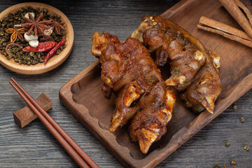 Delicious roast pig feet on the plate