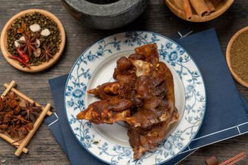 Delicious roast pig feet on the plate