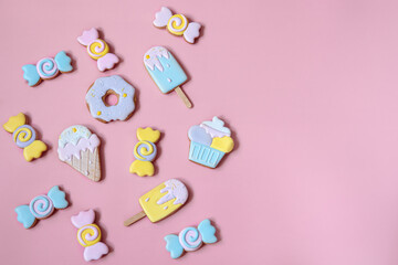 Colorful gingerbread cookies in colored glaze of different shapes.