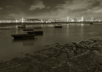 Fototapeta premium Skyline of Shenzhen city, China at night. Viewed from Hong Kong border Lau Fau Shan