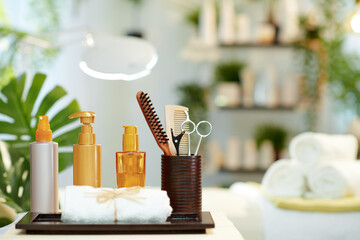 towel and hair care products in modern beauty studio