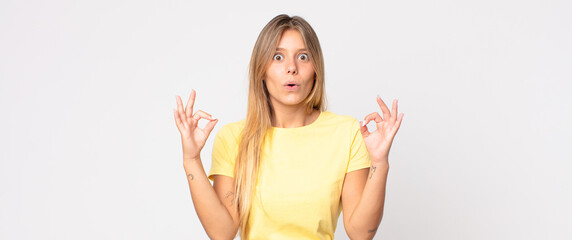 blonde pretty woman scheming and conspiring, thinking devious tricks and cheats, cunning and...