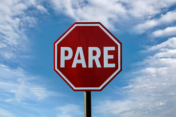 mandatory stop sign, in Portuguese PARE