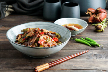 Lotus root or Rhizome stir-fry with Shiitake mushrooms, spices, hot peppers, dark soy sauce and green onions