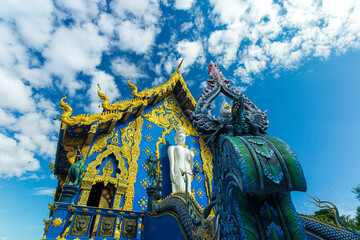 Temples in Chiang Rai Province, Thailand,Wat Rong seua ten or Chiang rai Blue temple, The famous tourism temple in Chiang rai, Thailand. There is a great art work and blue big Buddha statue.