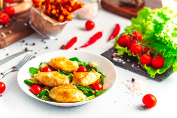 Camembert. Fried camembert cheese with batat fries. Cheese with salad with tomatoes. Fresh food