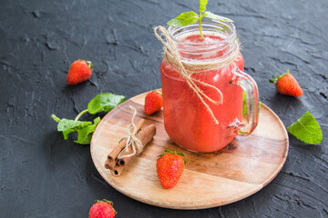 Healthy smoothie of fresh summer berries. Creative atmospheric decoration