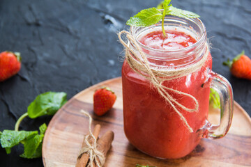 Healthy smoothie of fresh summer berries. Creative atmospheric decoration