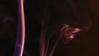 Smoke with Background structure and color foils Photographed in the studio